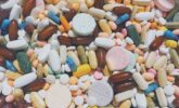 pharmaceutical-soup-colorful-sea-of-prescription-medicines-vitamins-and-supplements-what-ails-you-a_t20_kneVar
